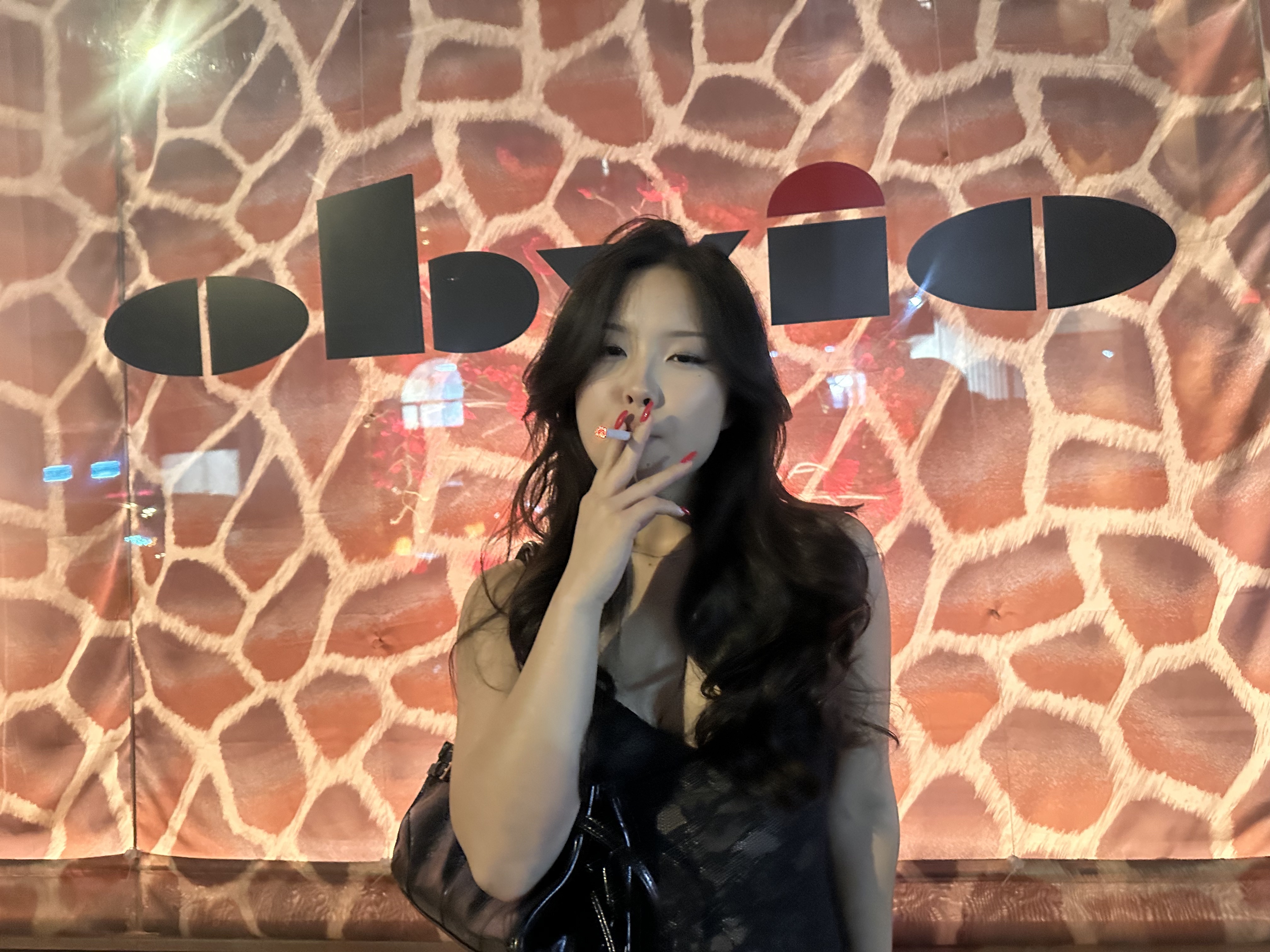 Tall arched Art Deco window with decorative metalwork — London